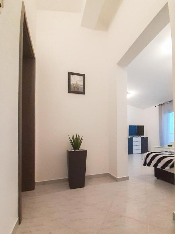 Postel nebo postele na pokoji v ubytování Sunshine Apartment