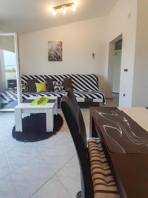 Posezení v ubytování Sunshine Apartment