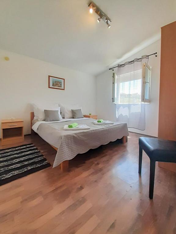 Postel nebo postele na pokoji v ubytování Sunshine Apartment