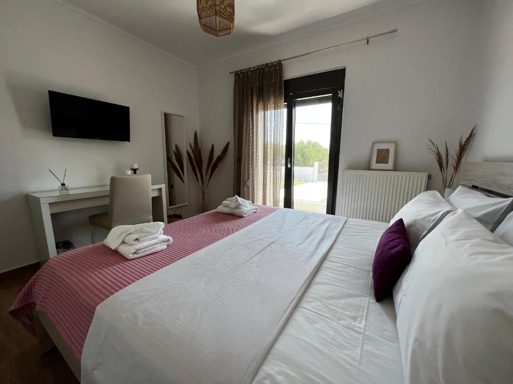 Łóżko lub łóżka w pokoju w obiekcie Casa di Somnia Luxury Residence