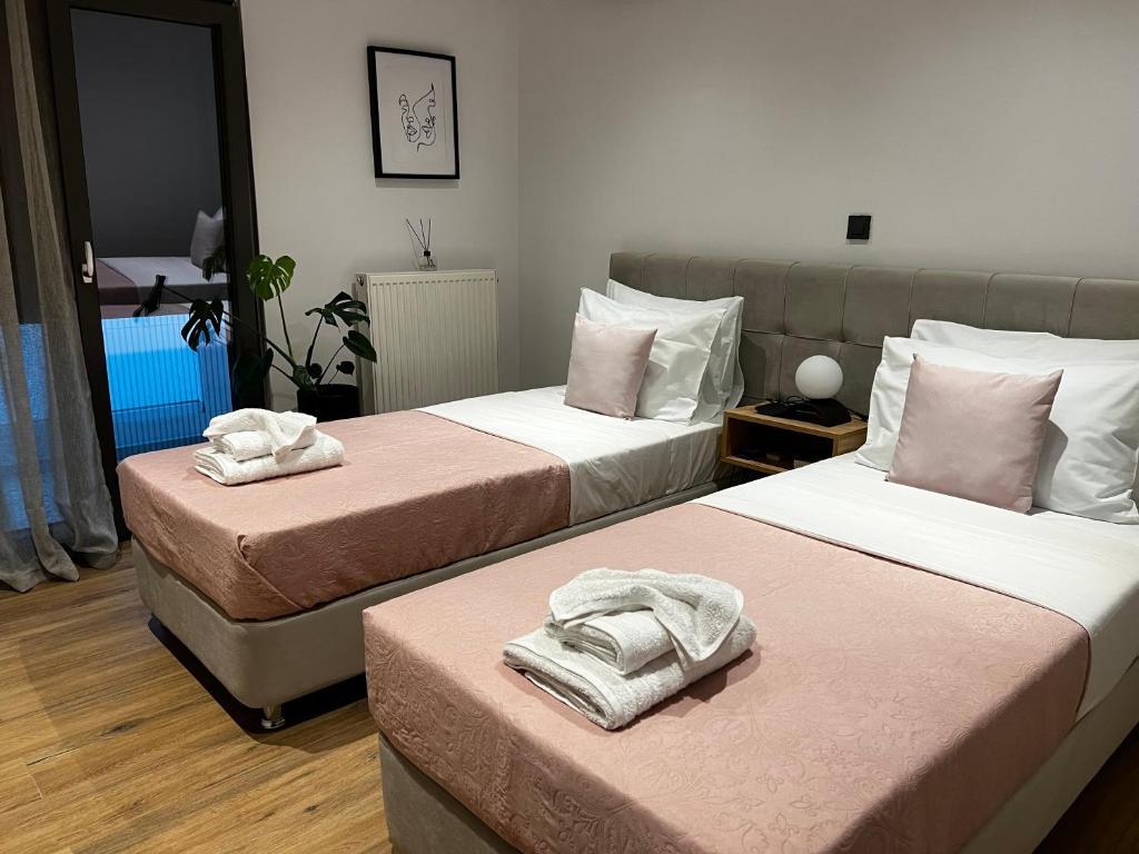 Łóżko lub łóżka w pokoju w obiekcie Casa di Somnia Luxury Residence