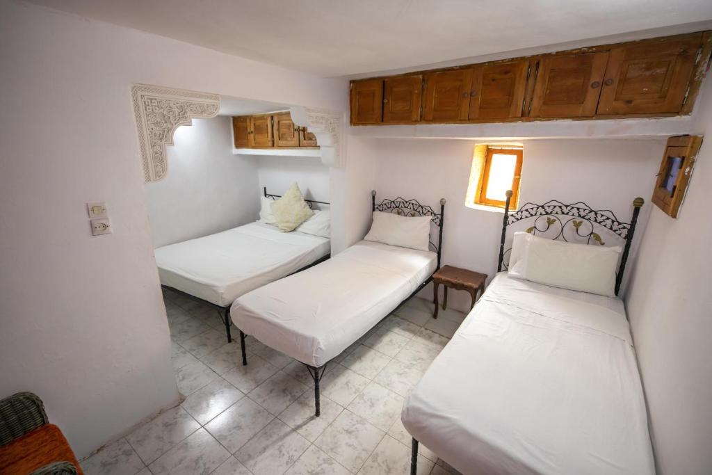 Postel nebo postele na pokoji v ubytování Fes Hostel Home