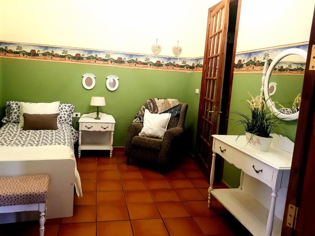A bed or beds in a room at Casa La Dama de Arucas