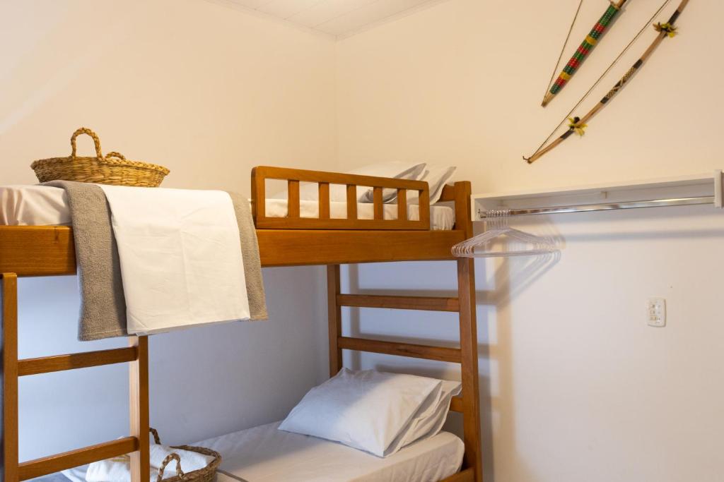 Postel nebo postele na pokoji v ubytování Casa azul Ilha Grande