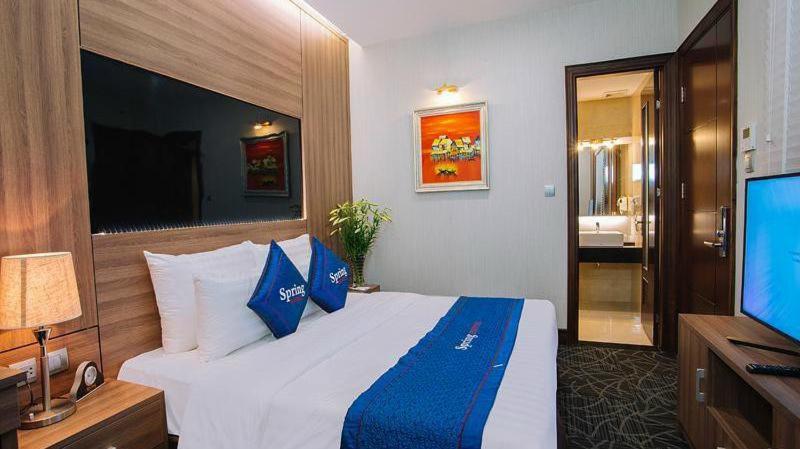 Voodi või voodid majutusasutuse Spring Hotel Hanoi toas