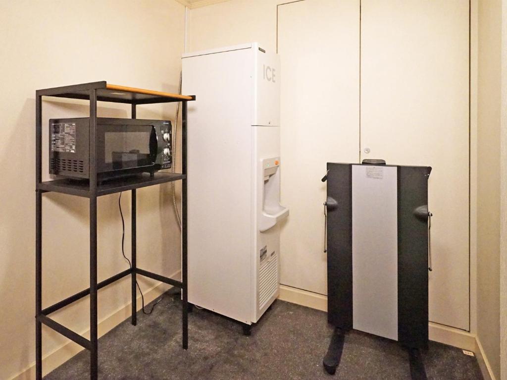Kuchyň nebo kuchyňský kout v ubytování Chisun Hotel Yokohama Isezakicho