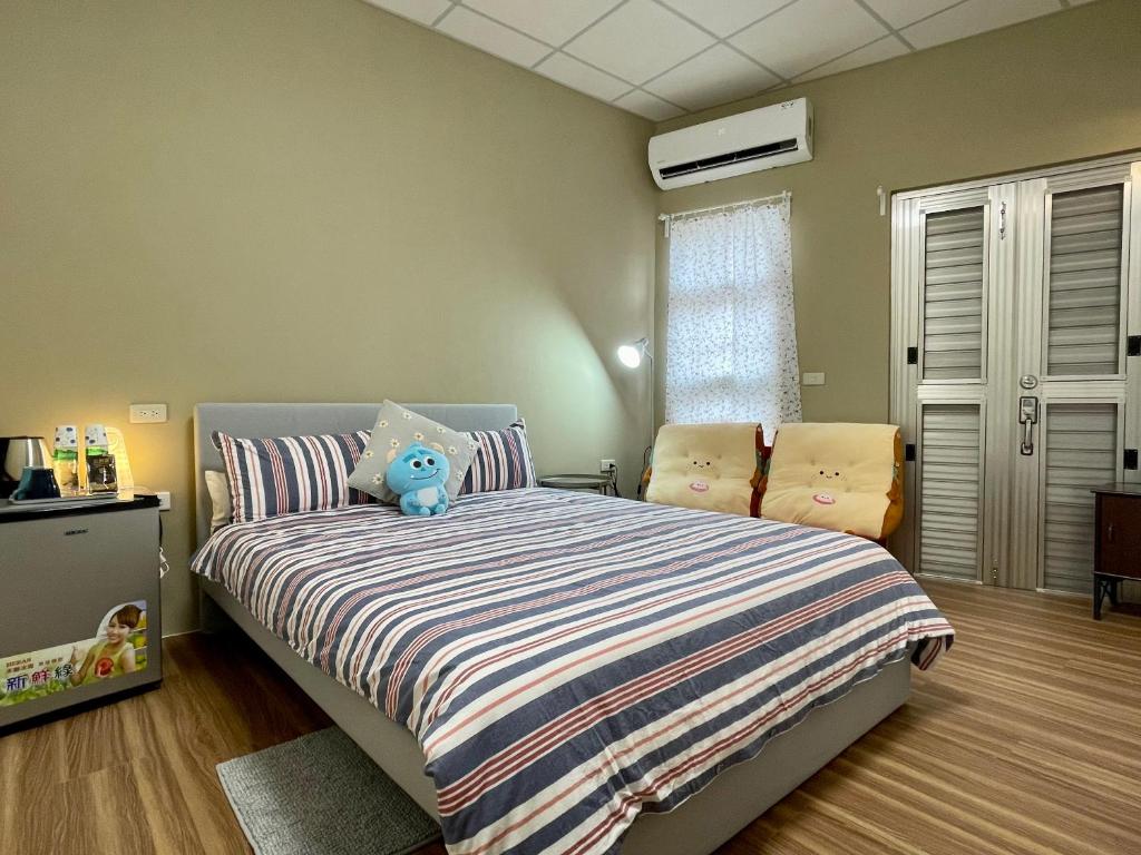 Voodi või voodid majutusasutuse ShinYuan BNB toas
