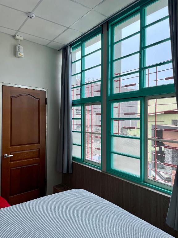 Voodi või voodid majutusasutuse ShinYuan BNB toas