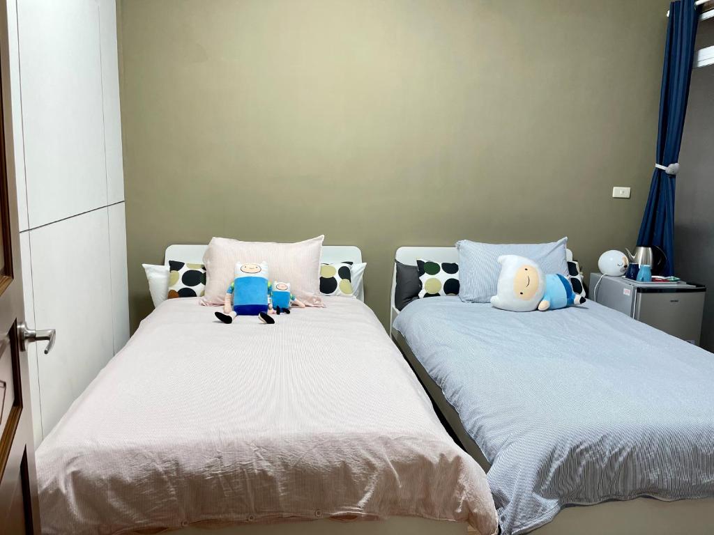 Voodi või voodid majutusasutuse ShinYuan BNB toas
