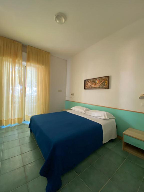 Postel nebo postele na pokoji v ubytování Hotel Plaza con piscina