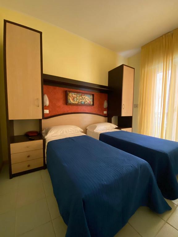 Postel nebo postele na pokoji v ubytování Hotel Plaza con piscina