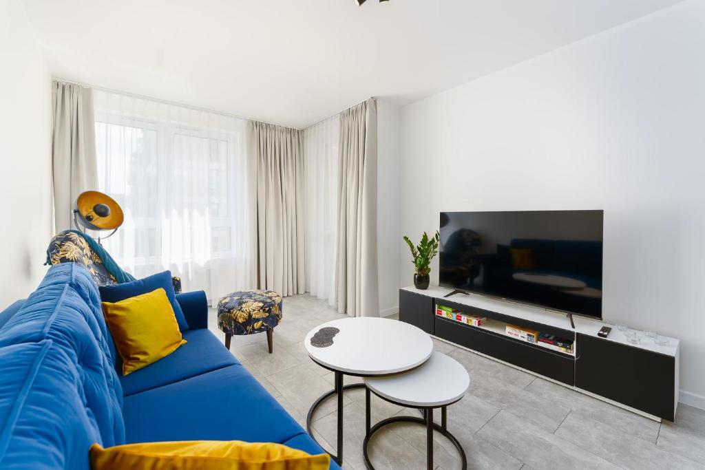 TV a/nebo společenská místnost v ubytování Apartamenty Adyl Platany
