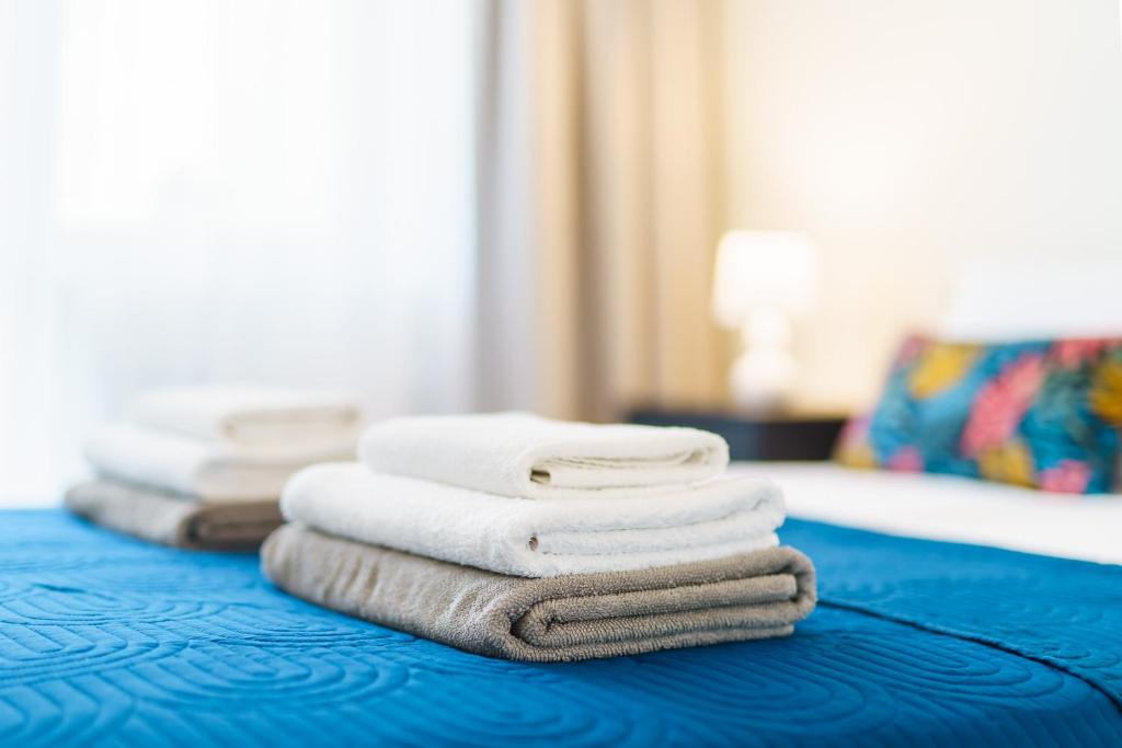 Postel nebo postele na pokoji v ubytování Apartamenty Adyl Platany