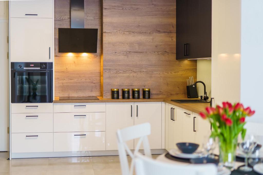 Kuchyň nebo kuchyňský kout v ubytování Apartamenty Adyl Platany