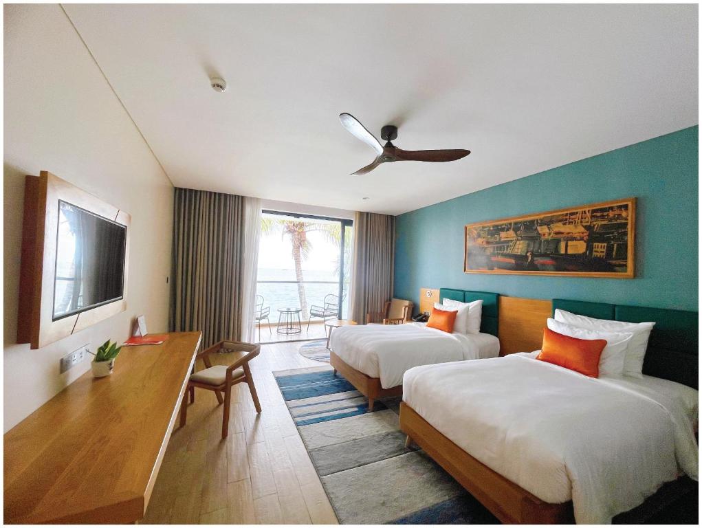 Bungalow Premier 2 Giường Đơn Có Ban Công Và Tầm Nhìn Ra Biển