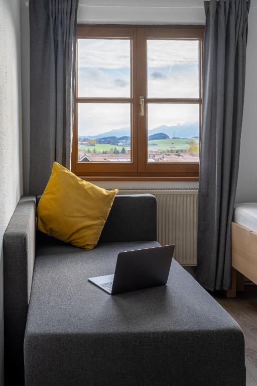 Postel nebo postele na pokoji v ubytování Alps Hostel