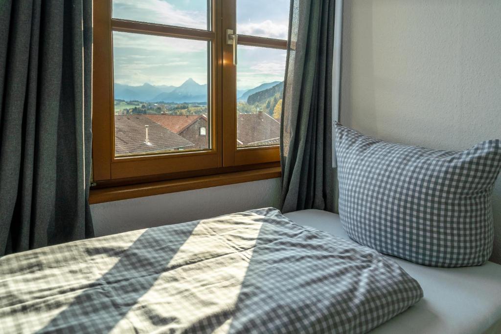 Postel nebo postele na pokoji v ubytování Alps Hostel
