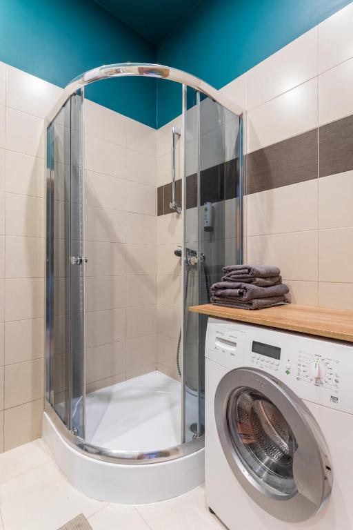 Kúpeľňa v ubytovaní Apartamenty Łazarza 17