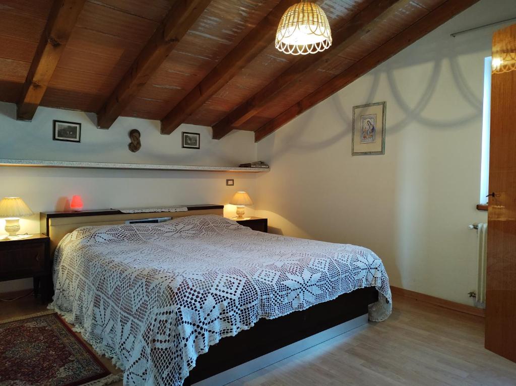 Posteľ alebo postele v izbe v ubytovaní Villa-Giardino "Le None"