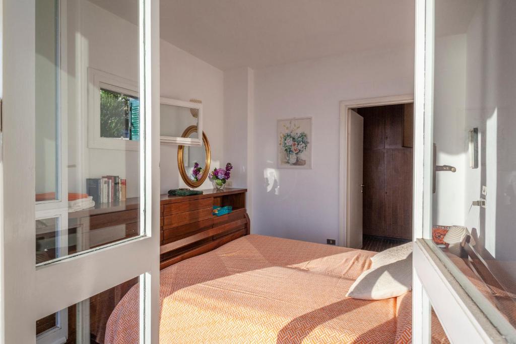 A bed or beds in a room at Orizzonti blu! In villaggio esclusivo con terrazza