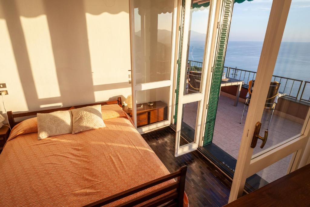 A bed or beds in a room at Orizzonti blu! In villaggio esclusivo con terrazza
