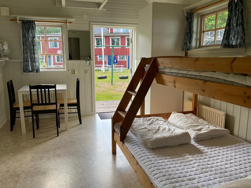 Postel nebo postele na pokoji v ubytování Aspan Kurs & Lägergård