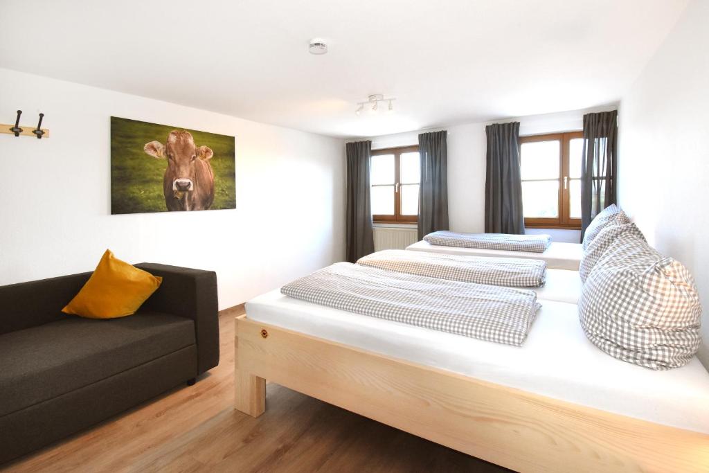 Postel nebo postele na pokoji v ubytování Alps Hostel