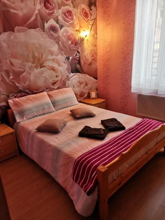 Postel nebo postele na pokoji v ubytování Chambres d'hôtes Natacha et Franck