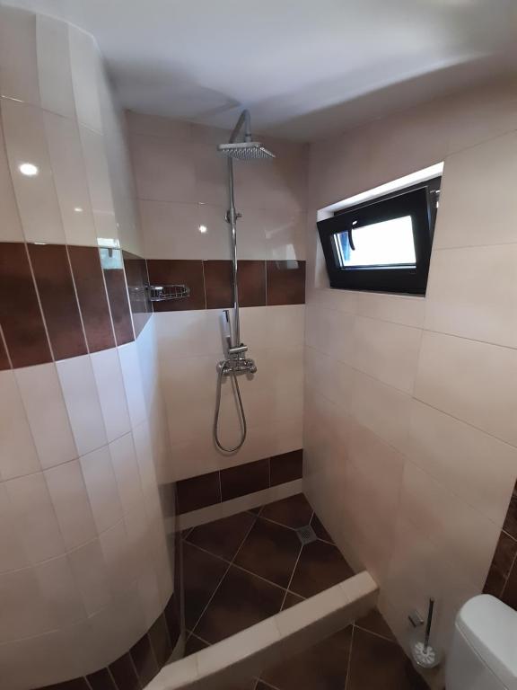Koupelna v ubytování Guest house-restaurant St. George / Къща за гости-ресторант Свети Георги