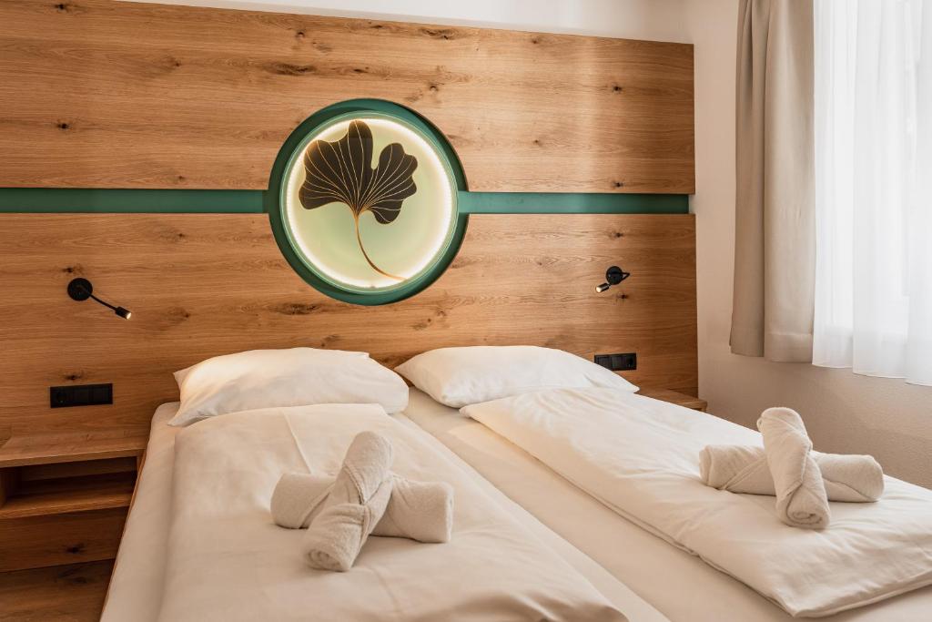 Postel nebo postele na pokoji v ubytování ''die Bergerin'' | Appartements Schladming