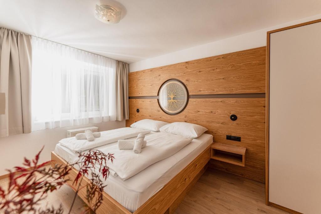 Postel nebo postele na pokoji v ubytování ''die Bergerin'' | Appartements Schladming