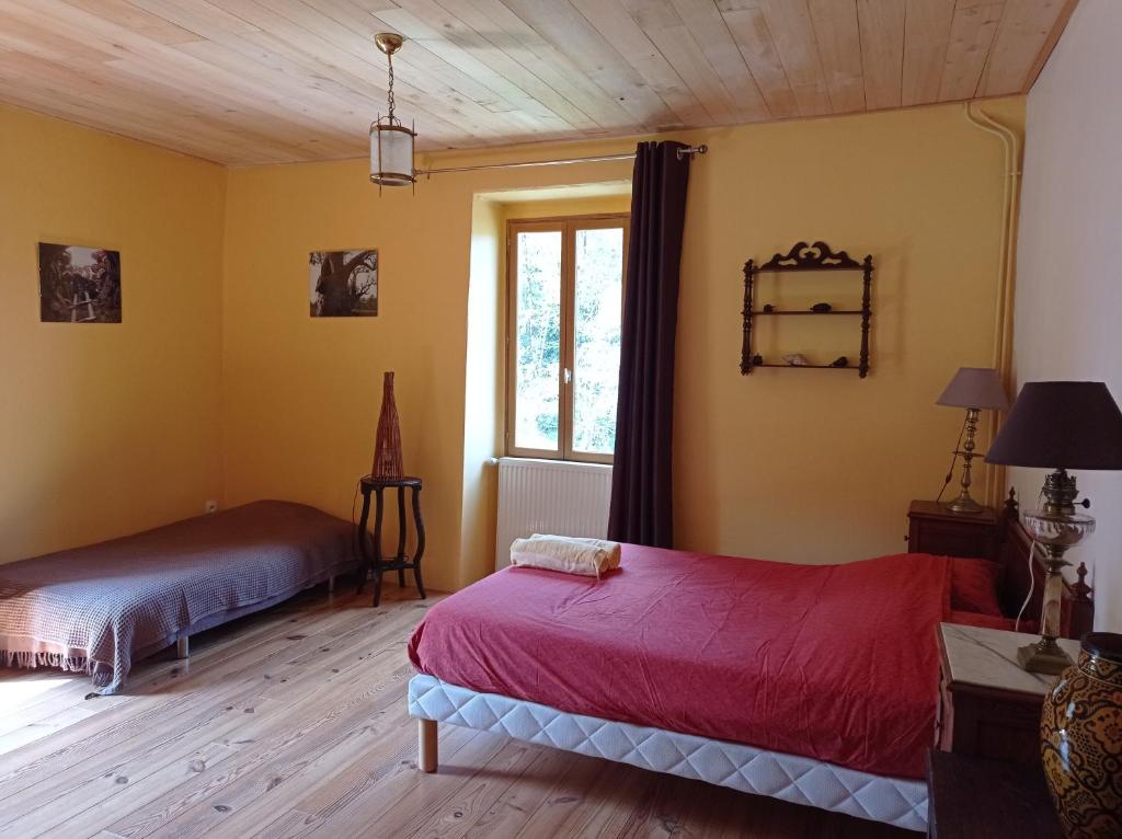 Postel nebo postele na pokoji v ubytování A la Source