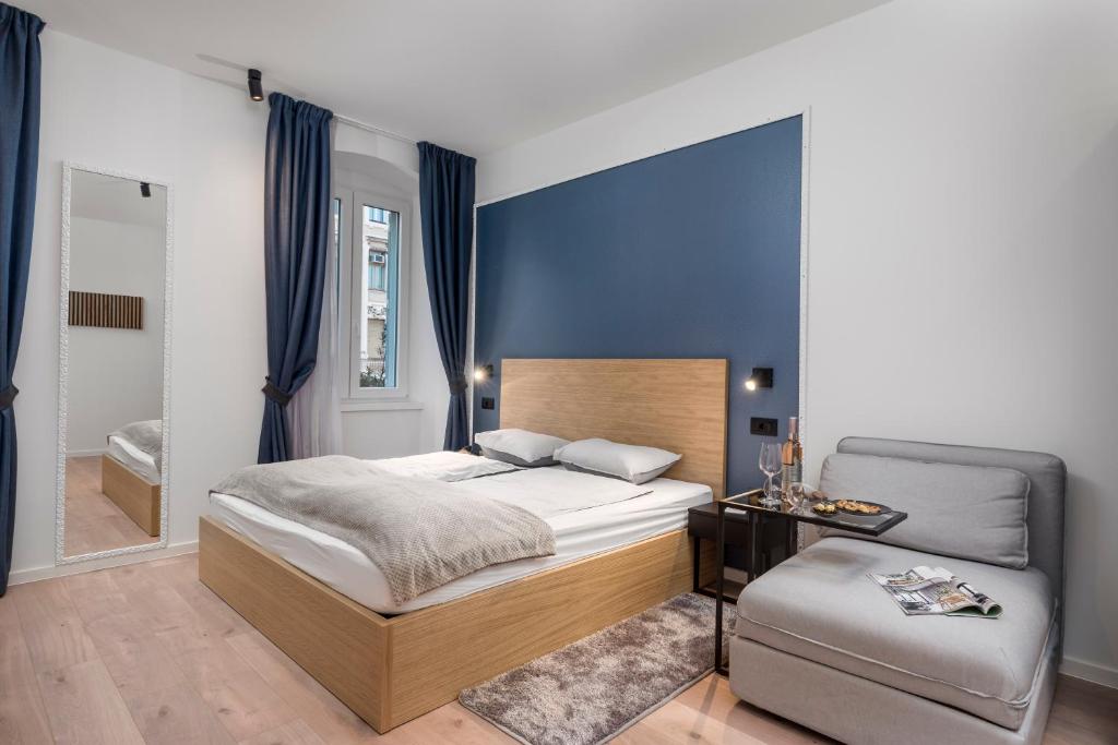 Posteľ alebo postele v izbe v ubytovaní Deluxe Apartments ''In the Center''