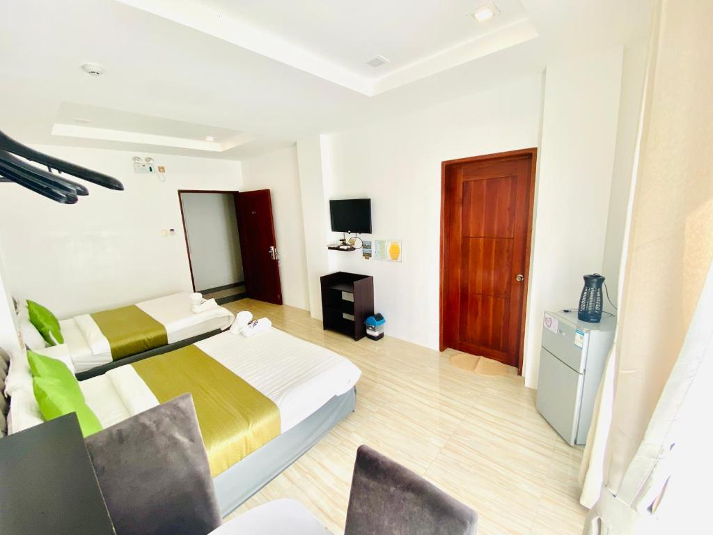 TV a/nebo společenská místnost v ubytování Mirage Suites de Boracay
