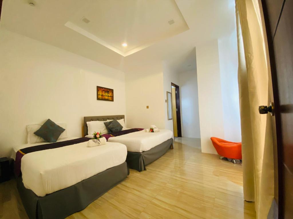 Postel nebo postele na pokoji v ubytování Mirage Suites de Boracay