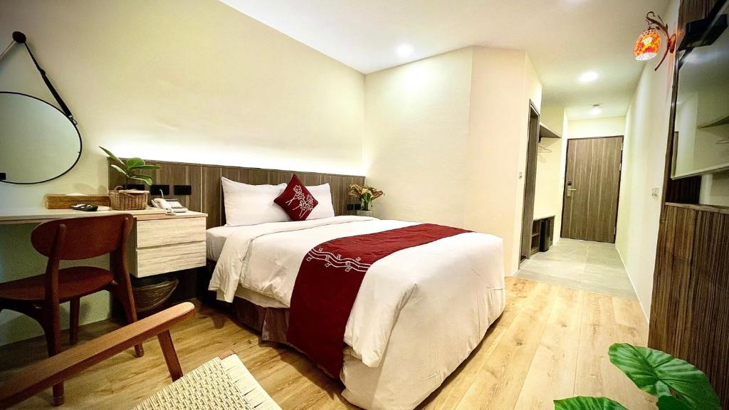 Postel nebo postele na pokoji v ubytování 海的墾丁旅店 Ocean KT Inn