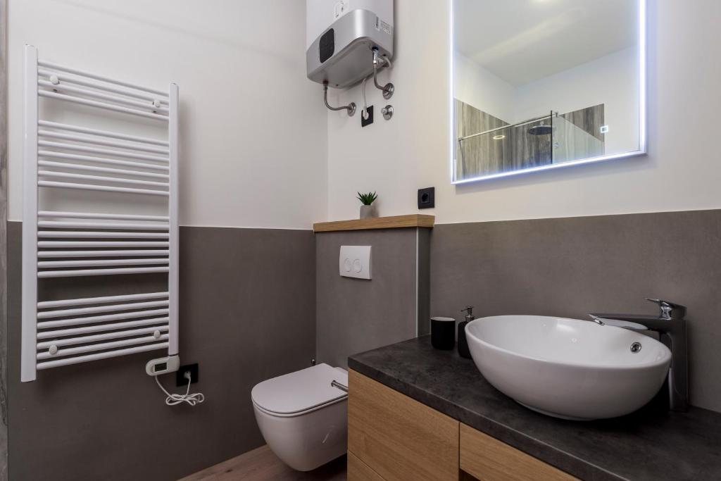 Kúpeľňa v ubytovaní Deluxe Apartments ''In the Center''