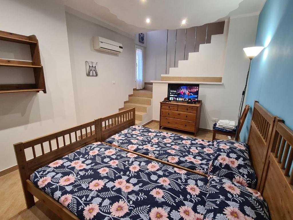 A bed or beds in a room at Relax La Torricella