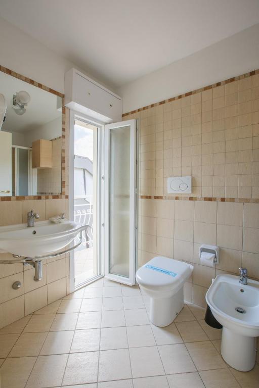 Koupelna v ubytování Hotel Ada