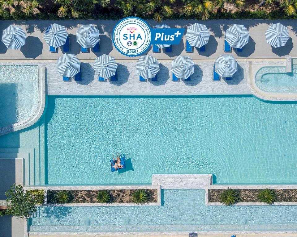 an overhead view of a pool at a resort at Seabed Grand Hotel Phuket - SHA Extra Plus in Phuket Town