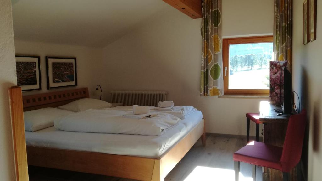 Postel nebo postele na pokoji v ubytování Sinabell by Schladmingurlaub