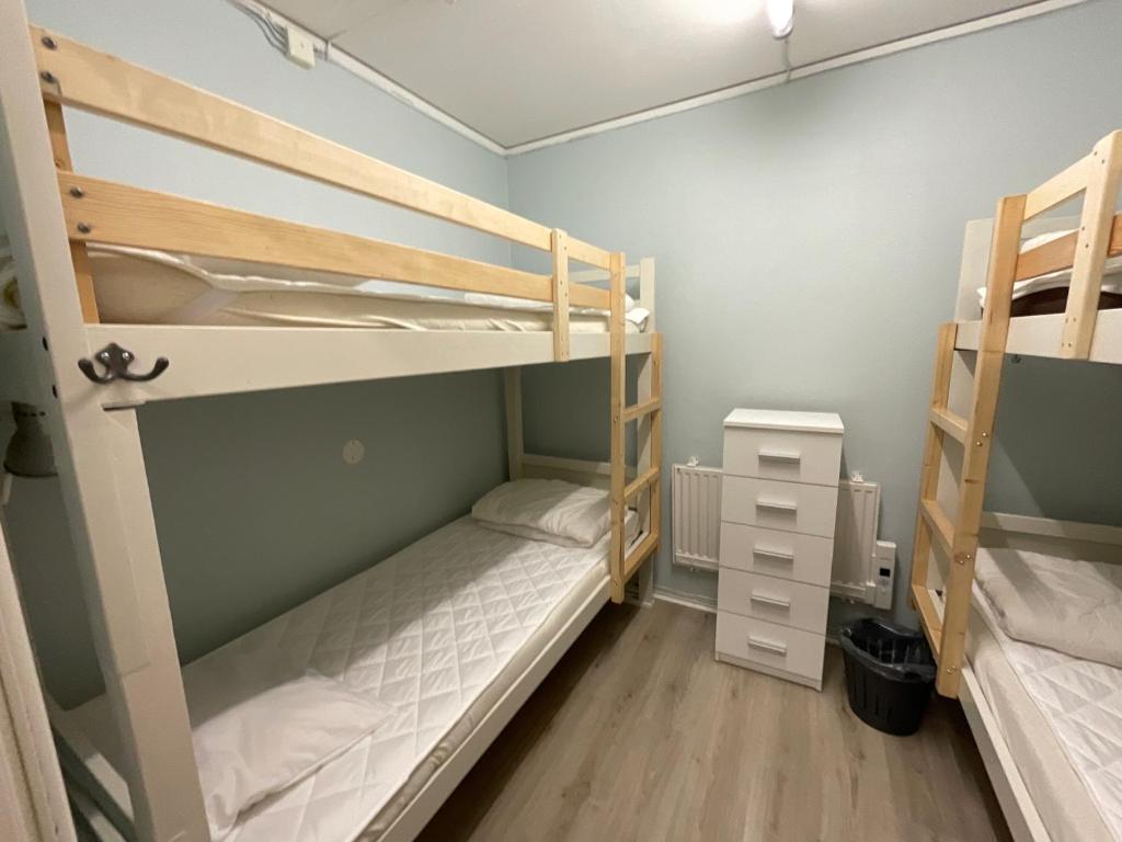 Postel nebo postele na pokoji v ubytování Aspan Kurs & Lägergård