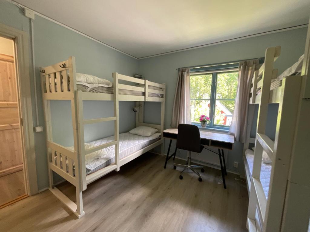 Postel nebo postele na pokoji v ubytování Aspan Kurs & Lägergård