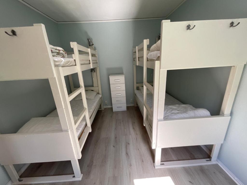 Postel nebo postele na pokoji v ubytování Aspan Kurs & Lägergård