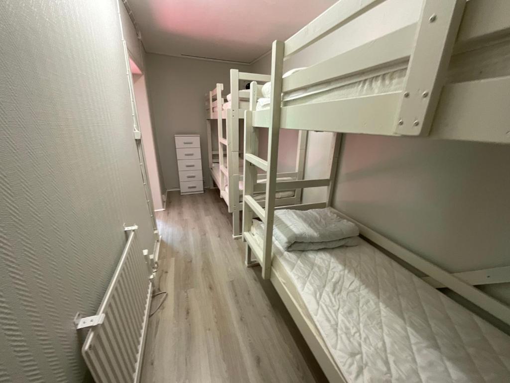 Postel nebo postele na pokoji v ubytování Aspan Kurs & Lägergård