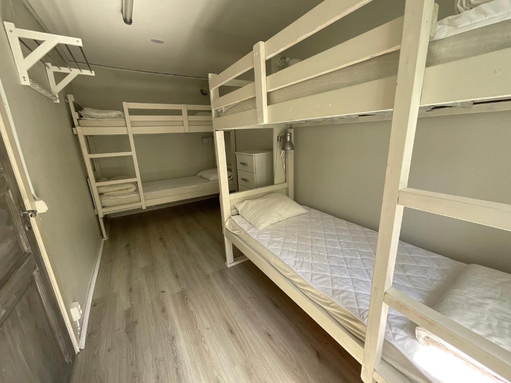 Postel nebo postele na pokoji v ubytování Aspan Kurs & Lägergård