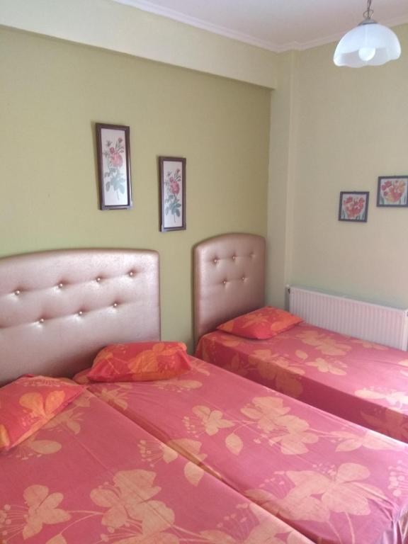 Postel nebo postele na pokoji v ubytování Villa Elli