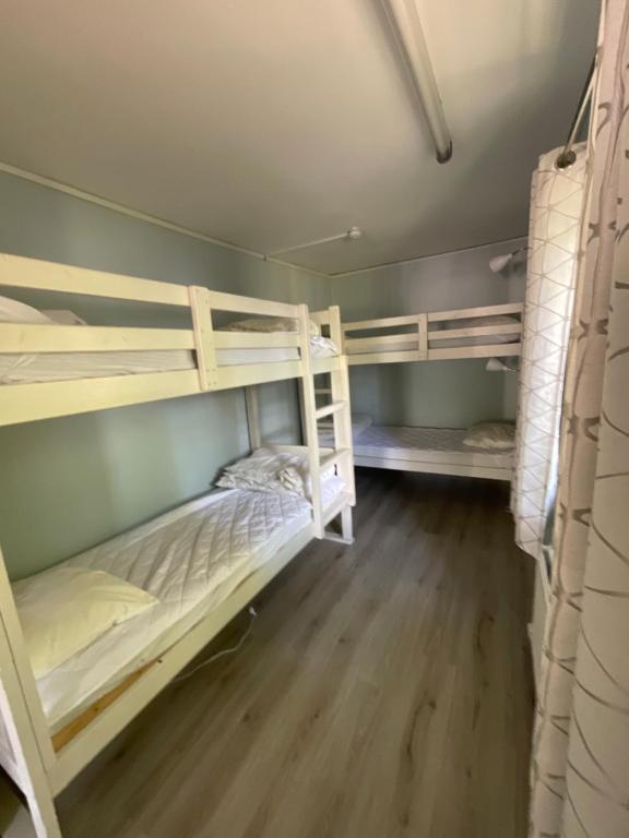 Postel nebo postele na pokoji v ubytování Aspan Kurs & Lägergård