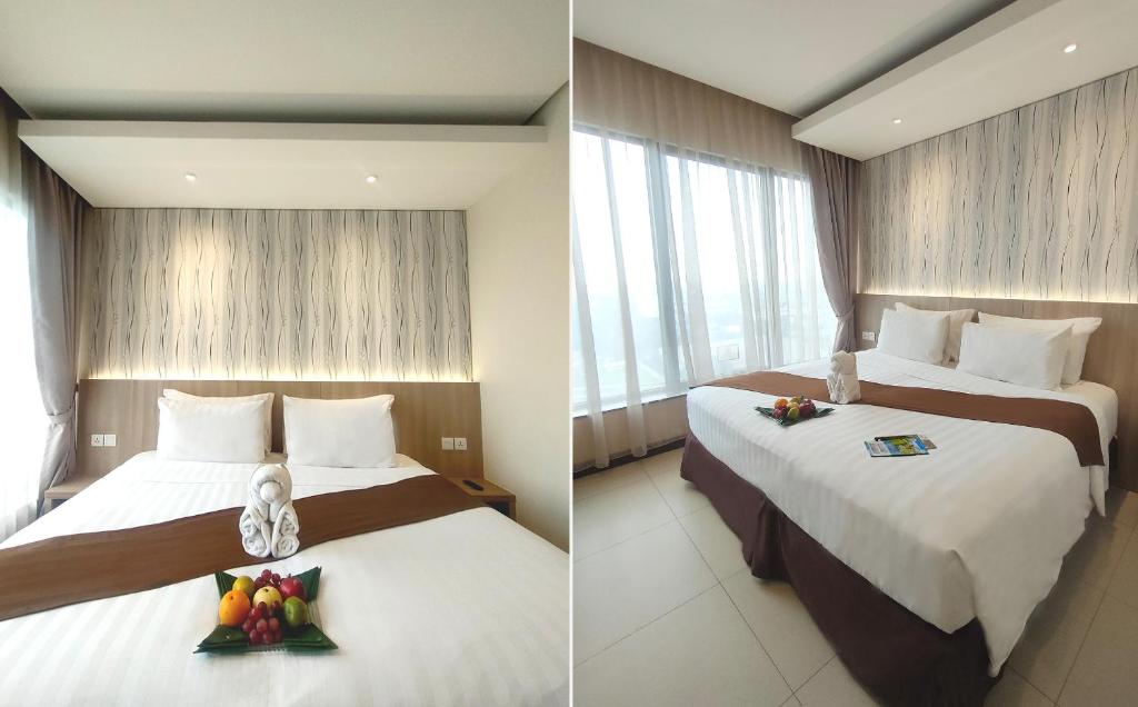 Postel nebo postele na pokoji v ubytování Vasaka Hotel Jakarta Managed by Dafam