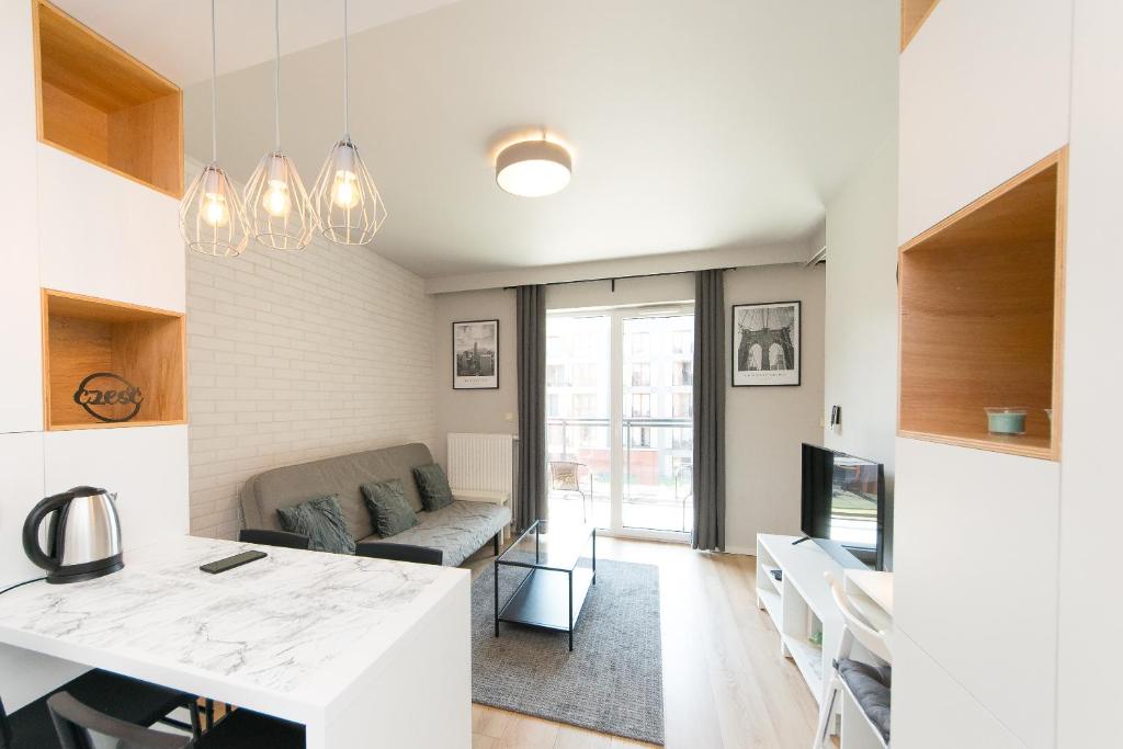 Kuchyňa alebo kuchynka v ubytovaní Main Trainstation one bedroom AC p4you pl
